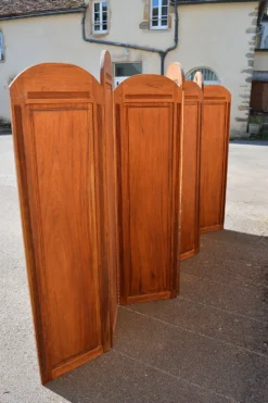 Paravent Art Deco à 7 panneaux sculptés aux insignes de la Légion Etrangère, vers 1940