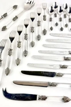 Partie de menagere en métal argenté ,plexiglass et inox