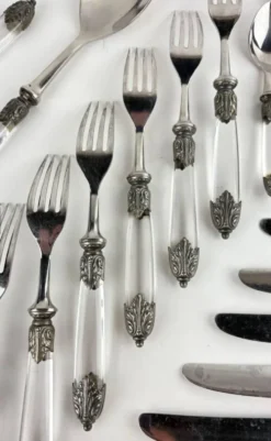 Partie de menagere en métal argenté ,plexiglass et inox
