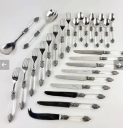 Partie de menagere en métal argenté ,plexiglass et inox
