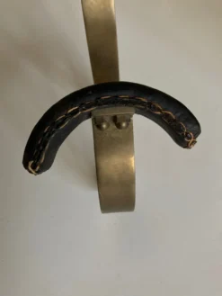 Patère Adnet en bronze et cuir 1950