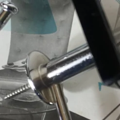 2 patères anciennes en verre fumé marron et inox Fontana Arte / Veca