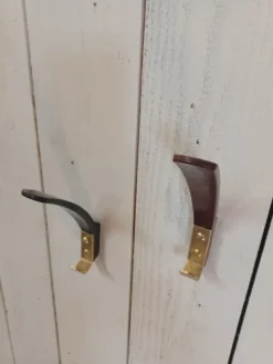 10 patères, KM Austria, bakélite et laiton