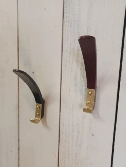 10 patères, KM Austria, bakélite et laiton