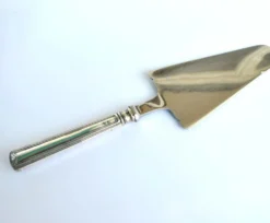 Pelle à tarte vintage en métal argenté et lame inox - Décor au filet contour