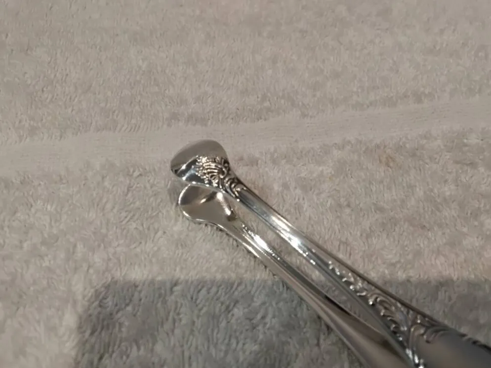Petite pince à sucre métal argenté orfèvre Christofle Marly 11,3cm
