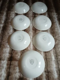 7 petites assiettes creuses Salins France
