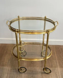 Petite table roulante ovale en laiton à double plateaux amovibles de la Maison Bagués