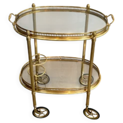 Petite table roulante ovale en laiton à double plateaux amovibles de la Maison Bagués
