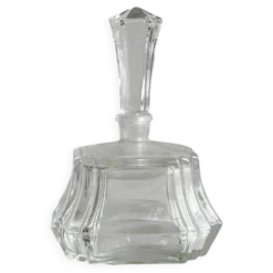 Petit flacon en verre facetté transparent