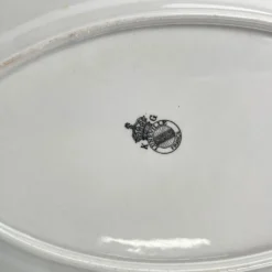 Petit plat ovale à bout plat modèle Réverbère par KG Lunéville, motif tulipe