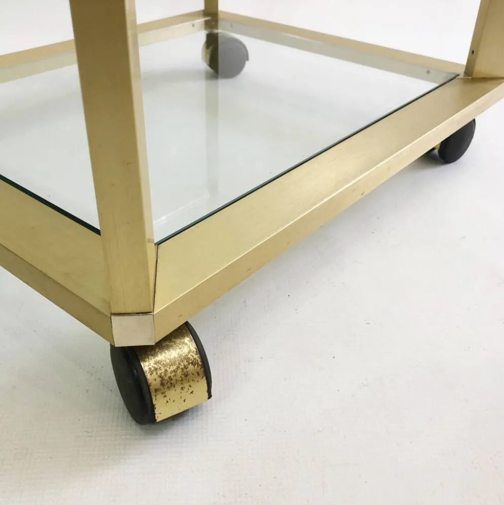 Pierre Vandel Étagère dorée sur roulettes Années 1970 Mid Century Hollywood Regency Shelving