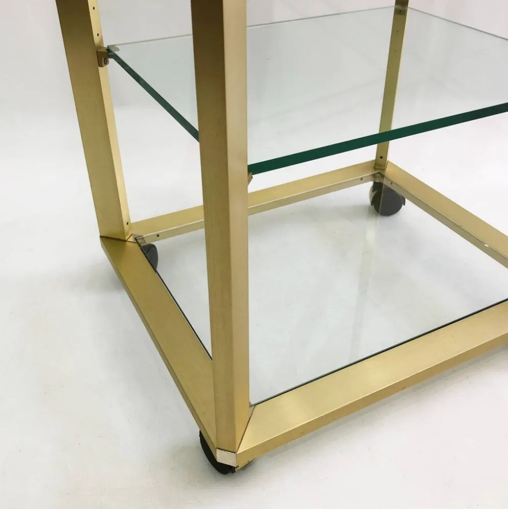 Pierre Vandel Étagère dorée sur roulettes Années 1970 Mid Century Hollywood Regency Shelving