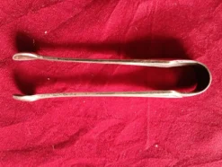 Pince a sucre en metal argente art deco