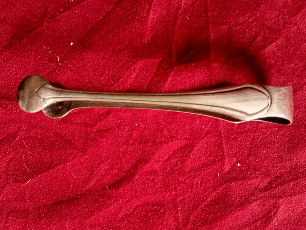 Pince a sucre en metal argente art deco