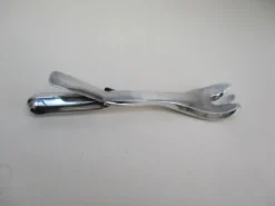 Pince de service en métal argenté gulden