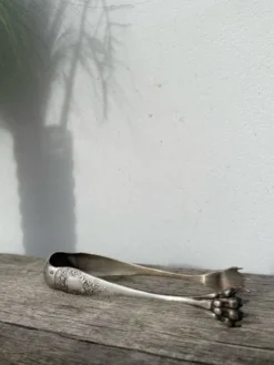 Pince à sucre en métal argenté