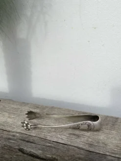 Pince à sucre en métal argenté