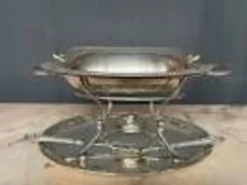 Plat chauffant ancien en métal argenté 