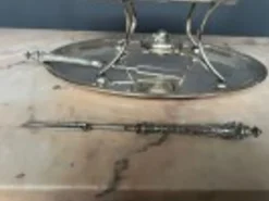 Plat chauffant ancien en métal argenté 