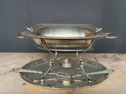 Plat chauffant ancien en métal argenté 