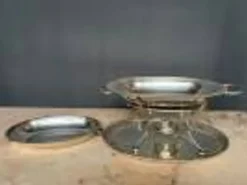 Plat chauffant ancien en métal argenté 