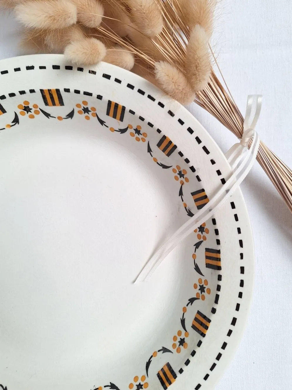 Plat creux Gien orange et noir modèle 456