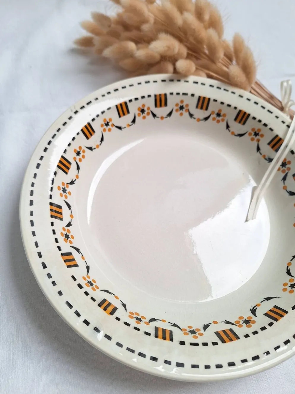 Plat creux Gien orange et noir modèle 456