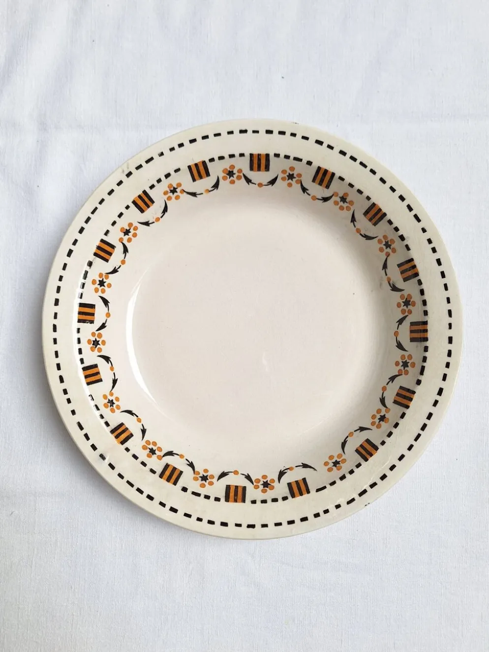 Plat creux Gien orange et noir modèle 456