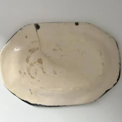 Plat décor poissons signé