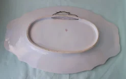Plat ovale en faïence style Lunéville