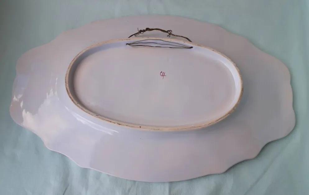 Plat ovale en faïence style Lunéville