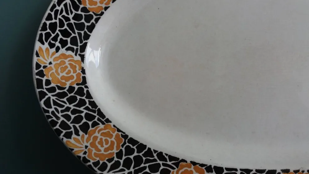 Plat ovale Sarreguemines décor Raincy au pochoir années 20 à 50