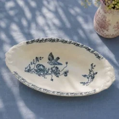 Plat terre de fer à l'oiseau du XIXe siècle signé Onnaing