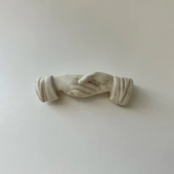 Porte-couteau mains jointes