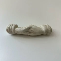 Porte-couteau mains jointes