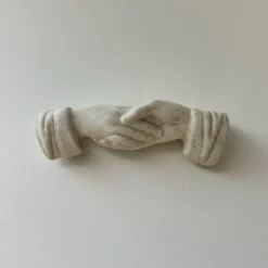 Porte-couteau mains jointes