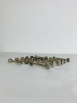 12 porte-couteaux art déco en métal argenté