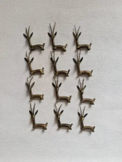 12 porte-couteaux bronze laiton art africain gazelles
