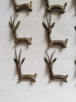 12 porte-couteaux bronze laiton art africain gazelles