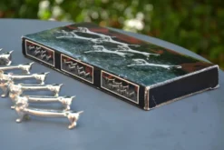 12 porte couteaux chat en métal argenté