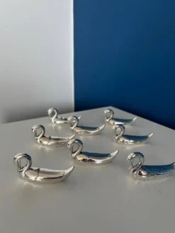 8 porte-couteaux cygnes vintage en métal argenté
