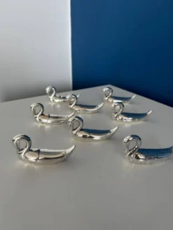 8 porte-couteaux cygnes vintage en métal argenté