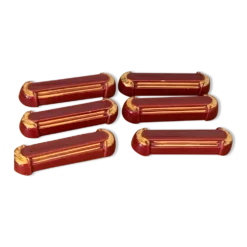 6 porte-couteaux en céramique émaillée bordeaux et liseré or art deco