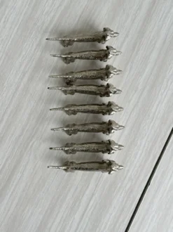 8 porte-couteaux en forme de chien teckel