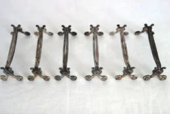 6 porte-couteaux en métal argenté Christofle