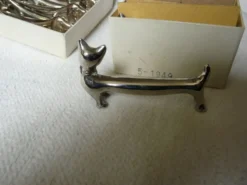 12 porte couteaux en métal argenté 6 chiens et 6 chats