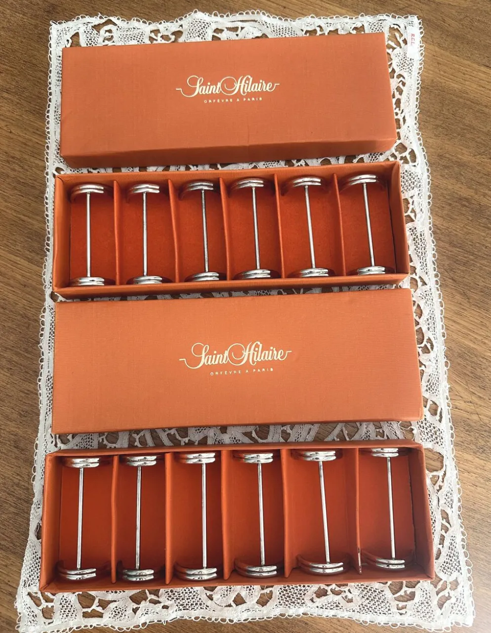 12 porte-couteaux en métal argenté Saint Hilaire modèle Arceaux en coffret