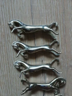 6 porte couteaux en métal argenté