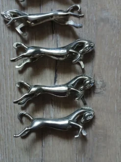 6 porte couteaux en métal argenté